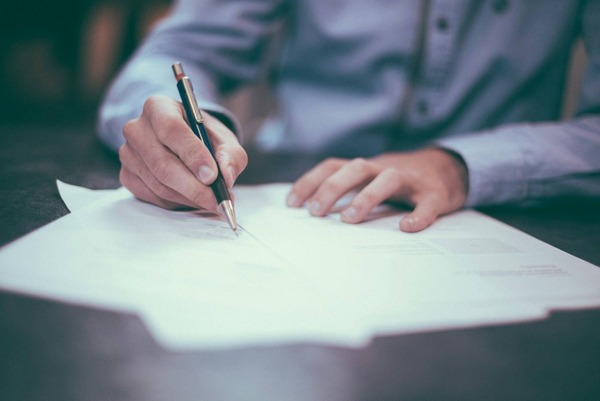 Real estate professionals reviewing acquisition opportunities at NextGen Properties
